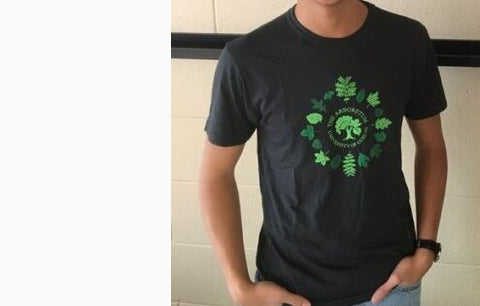 Dark grey men's organic cotton/bamboo t-shirt, made in Canada, featuring the leaves of 16 different tree species and The Arboretum's logo. The common and Latin names of the tree species are listed on the back of the shirt.