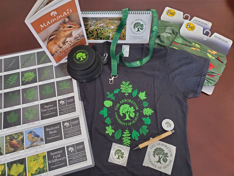 collage image of Mammal booklet, 3 biodiversity sheets, t-shirt, calendar, bowl, lanyard, buffs, stickers, button and pencil