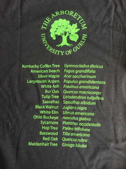 A close-up of The Arboretum's logo with the common names and Latin names of the 16 tree leaves featured on the front of the t-shirt. 